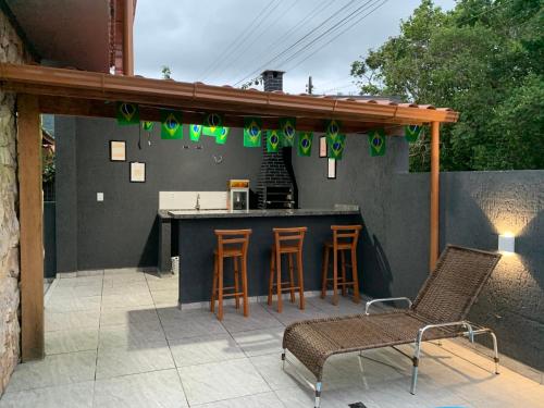 Casa de temporada no Sul da Ilha com piscina near Bar e Lanchonete Educao