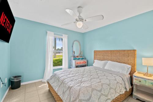 Coconut Cabana - Duplex Delight, Beach-Themed 6BR Retreat with 2 Outdoor Patios & GRILL, Steps from the Sand! in Melbourne, USA