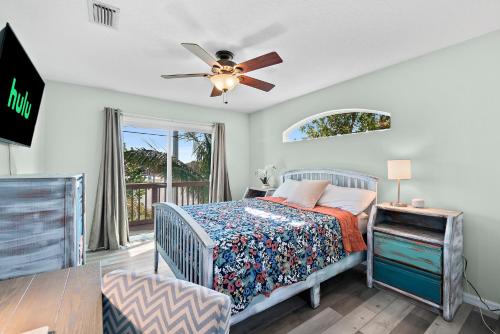 Coconut Cabana - Duplex Delight, Beach-Themed 6BR Retreat with 2 Outdoor Patios & GRILL, Steps from the Sand! in Melbourne, USA