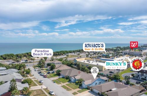 Serene Seaside Retreat - Dog friendly - 2BR Townhouse with Shared Heated Pool Steps to Paradise Beach!