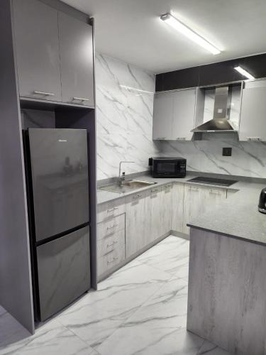 Kitchen, Sea Views at 10 South in South Beach