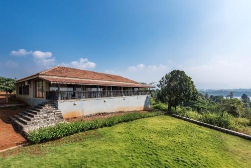 SaffronStays Anantham, Kamshet - pet-friendly lakefront villa with a huge verandah