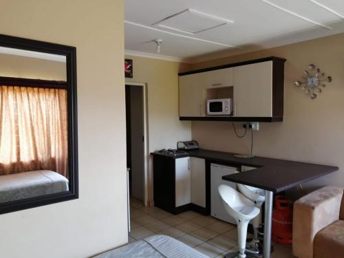 ห้องครัว, Ezweni Lodge in อัมห์ลังการ็อค