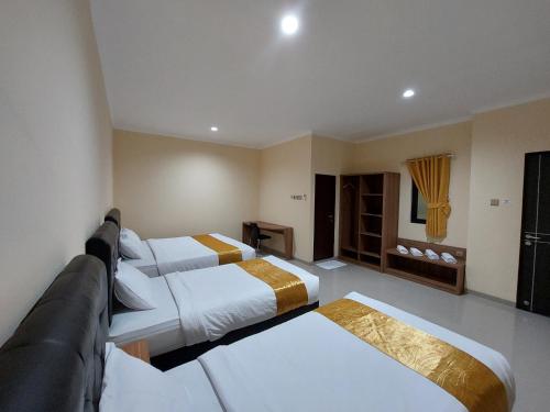 Harmony Inn Belitung - City Hotel - Tap to explore photos