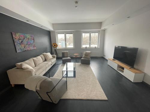 TruRetreats Design Loft für 8 Personen I Riesige Küche I eCharger I 65z SmartTV I 150qm, Hamburg (photo 3)
