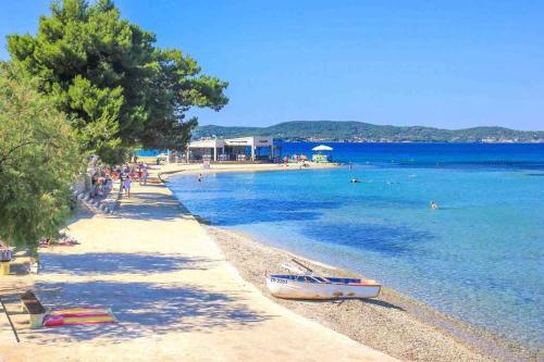 Strand, Holiday home in Sukosan - Zadar Riviera 43388 in Sukošan