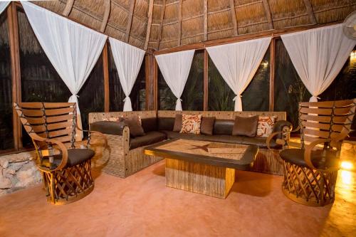 Shared lounge/TV area, ALDEA JO-YAH in Macario Gomez