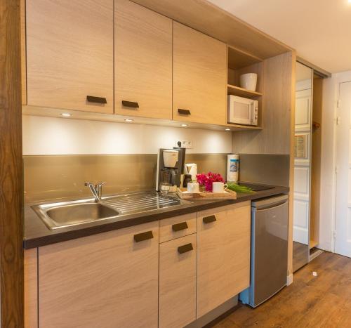 Orient Bay Palm Court Residence 4 Stars in Saint Martin