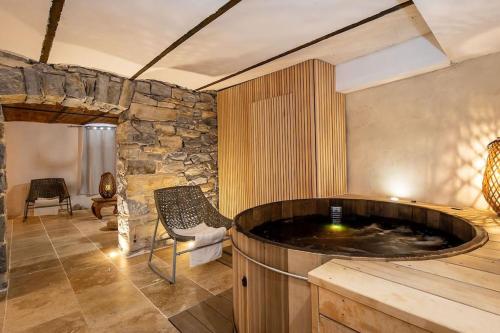 Hébergement Deluxe avec Grand Jacuzzi et Sauna Millau - Location saisonnière - Millau