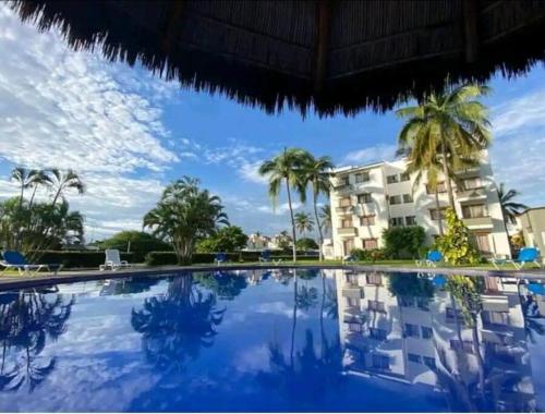 Magnifico Departamento, cocina equipada, 2 Recamaras 2 Banos , hasta 6 Personas, 3 albercas, playa a Manzanillo