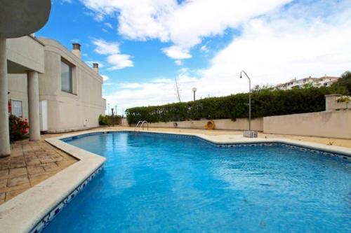  4 bedrooms house at Sitges 100 m away from the beach with sea view shared pool and furnished terrace, Pension in Sitges