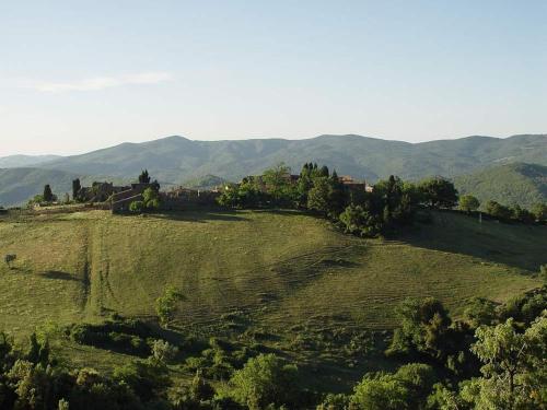 In a wonderful medieval village on the Tuscan hills, with air conditioning