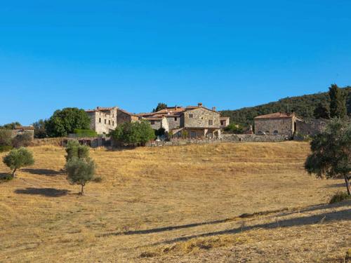 In a wonderful medieval village on the Tuscan hills, with air conditioning