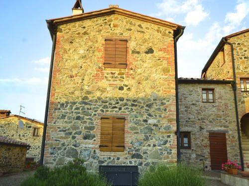 In a wonderful medieval village on the Tuscan hills, with air conditioning