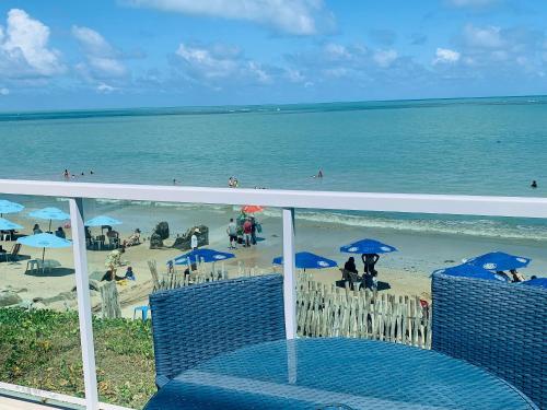 Flat pé na areia no caribessa com vista para mar