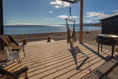 Dotări, Cala Melí (Cala Meli) in Puerto Varas Waterfront