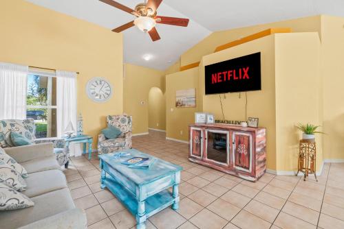 Heart of the Waves - 3BR & 2BA Beach Retreat - NEW HOT TUB - Outside Patio with Grill & Seating, Steps to Fun! in Melbourne, USA