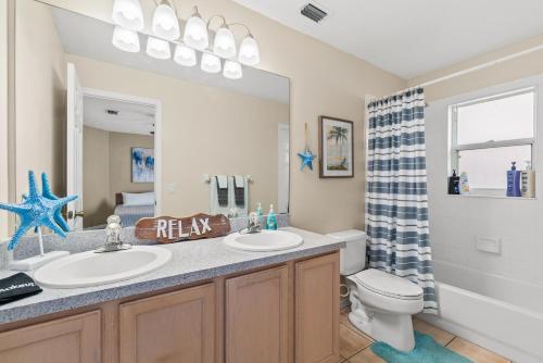 Heart of the Waves - 3BR & 2BA Beach Retreat - NEW HOT TUB - Outside Patio with Grill & Seating, Steps to Fun!