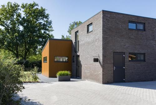  Vakantiehuis Eikzicht gelegen aan het bos, Pension in Elsloo