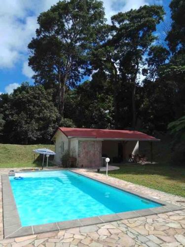 Les Lucioles 1 Beau T2 en forêt tropicale avec accès piscine (Les Lucioles 1 Beau T2 en foret tropicale avec acces piscine) in Saint-Joseph