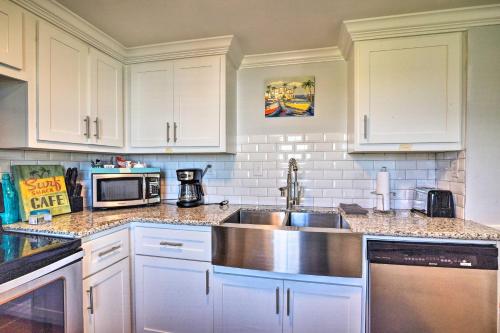 Upscale Galveston Cottage with Wraparound Deck! - image 14