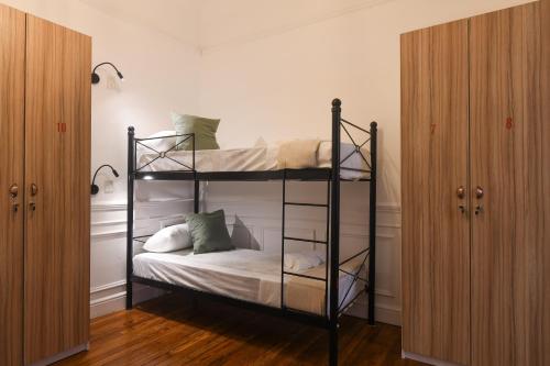 Single Bed in Male Dormitory Room image 5
