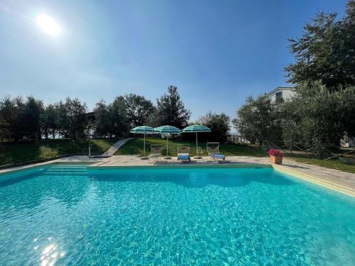 Swimming pool, Spacious holiday home in Marche with private pool in Belvedere Ostrense