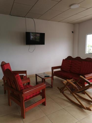 Közös társalgó / TV, Alojamiento Everglow in Iquitos