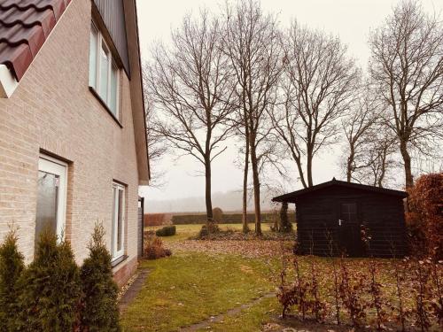 Magnanimous Holiday Home in Schoonloo with Jacuzzi - image 6