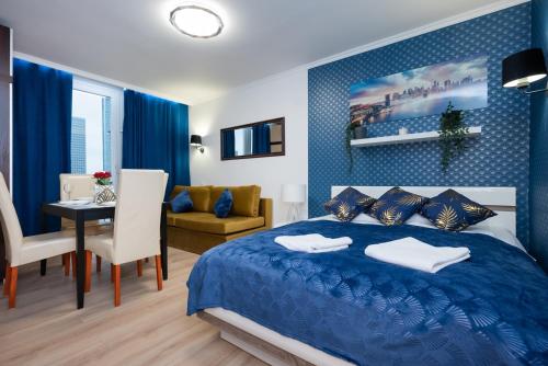 UnitApartments Rondo ONZ 3-pokojowe Apartamenty w Centrum Warszawy 1-8 osob Parking Metro WIFI Winda