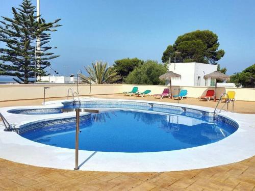 Apartment with terrace and pool by the sea