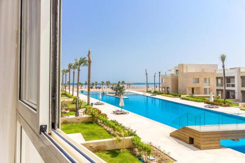 Mangroovy Seaview 1BR Beach and Pool Free access