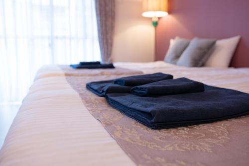 Bed, Japan Hinata Hotel 池下駅徒歩2分 1LDK 50平米 8名 in Chikusa