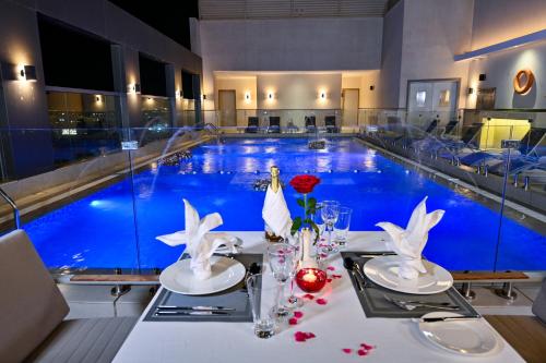 Swimming pool, Clarion Hotel Jeddah Airport near King Abdulaziz International Airport