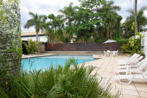 Swimming pool, Delphin Surf Hotel in Guaruja
