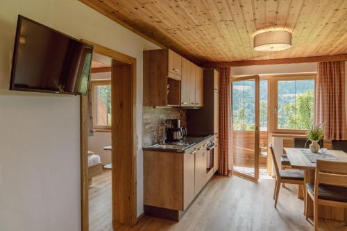 virtuve, Pircherhof Appartements in Haus im Ennštāla