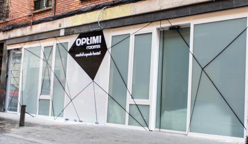 Optimi Rooms Madrid - Tap to explore photos