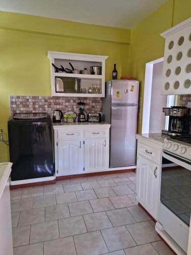 Kitchen, Coco Rose Apartments in Soufriere