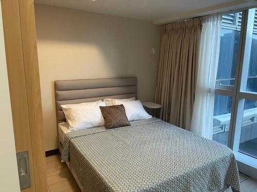 1 BR condo Uptown Parksuites BGC, high floor, morning sun, Manila (fotografie 3)