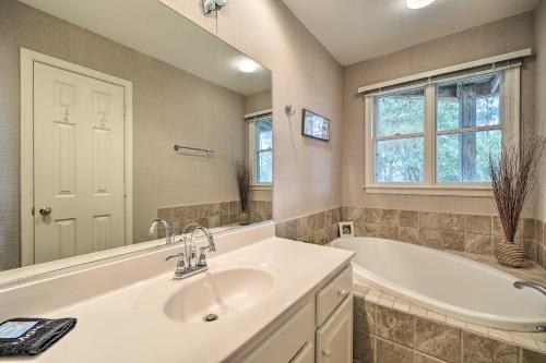 Coastal Home with Community Pool Less Than 2 Miles to Beach! - image 11
