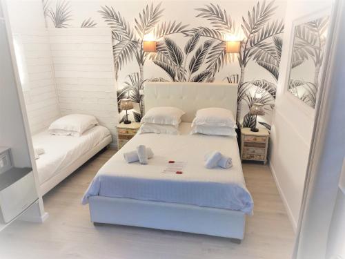Budget Triple Room room in Les Jardins de Bormes hôtel adult only avec piscine jacuzzi et sauna