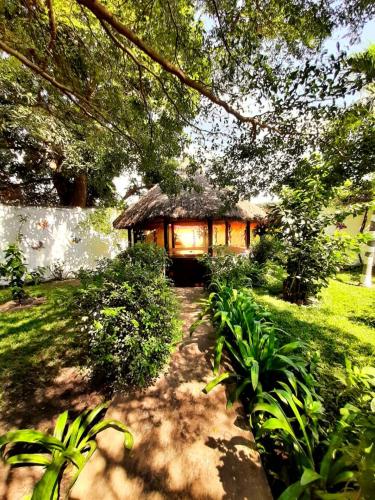 Giardino, Casa Hotel Sinkiling Gambia in Bijilo