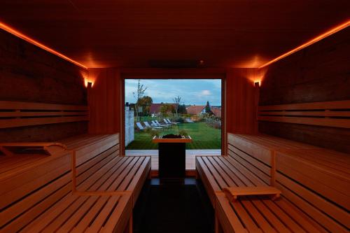 Landhotel Haringerhof mit Saunawelt und Naturbadeteich in 格拉芬豪森