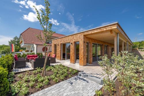 Landhotel Haringerhof mit Saunawelt und Naturbadeteich in 格拉芬豪森