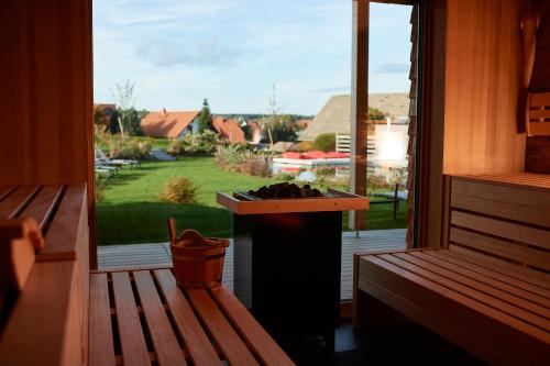 Landhotel Haringerhof mit Saunawelt und Naturbadeteich in 格拉芬豪森