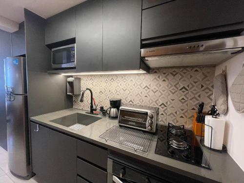 Cama queen | Lavanderia | Perto da Av. Paulista, São Paulo (fotografie 10)