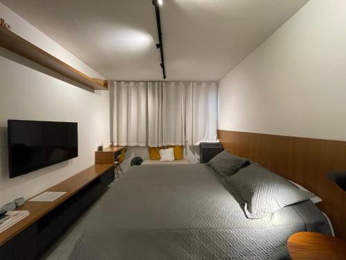 Cama queen | Lavanderia | Perto da Av. Paulista, São Paulo (fotografie 7)