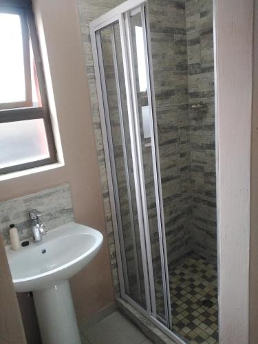 Bathroom, Sky city luxury guest house in Katlehong