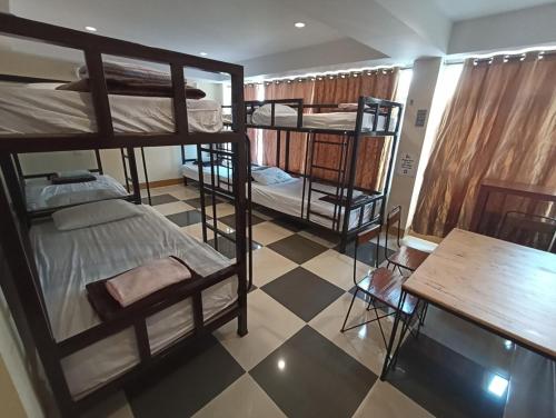 เตียงเดี่ยวในห้องพักรวมแบบ 4 เตียง (Single Bed in 4-Bed Dormitory Room)