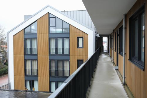 Widok z zewnątrz, Luxe en comfortabel appartement aan het water in Kamperland